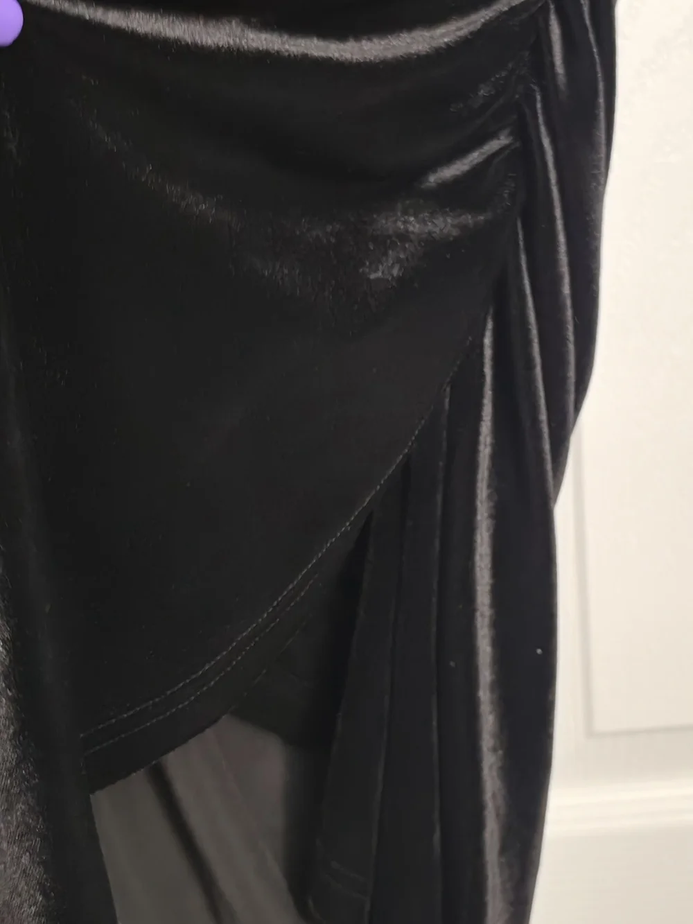 Source Unknown sleek black